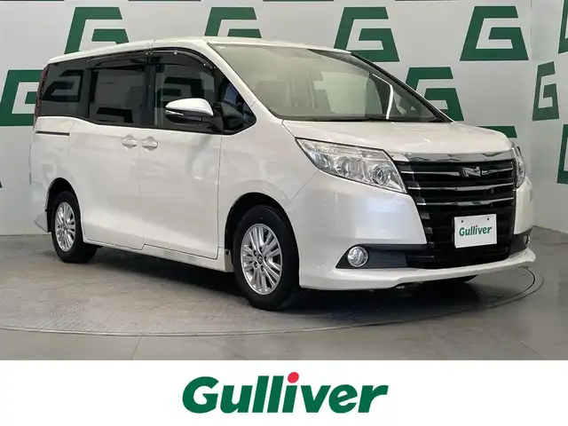 トヨタ ノア G 鹿児島県 2015(平27)年 9.2万km ホワイトパールクリスタルシャイン 純正ナビ/フルセグＴＶ/バックカメラ/オートマチックハイビーム/片側パワースライドドア/ＥＴＣ/アイドリングストップ/クルーズコントロール/ドライブレコーダー/横滑り防止装置/純正アルミホイール