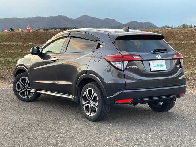 ホンダ ヴェゼル ハイブリッド Z ホンダセンシング 新潟県 2016(平28)年 9.1万km ルーセブラックM 4WD/純正SDナビ(VXM-164VFi)/CD/DVD/BT/フルセグテレビ/バックカメラ/ETC/衝突被害軽減ブレーキ/レーンキープアシスト/レーダークルーズコントロール/半革シート/シートヒーター/パドルシフト/ステアリングスイッチ/スマートキー/プッシュスタート/LEDヘッドライト/オートライト/フォグランプ/純正17インチアルミホイール