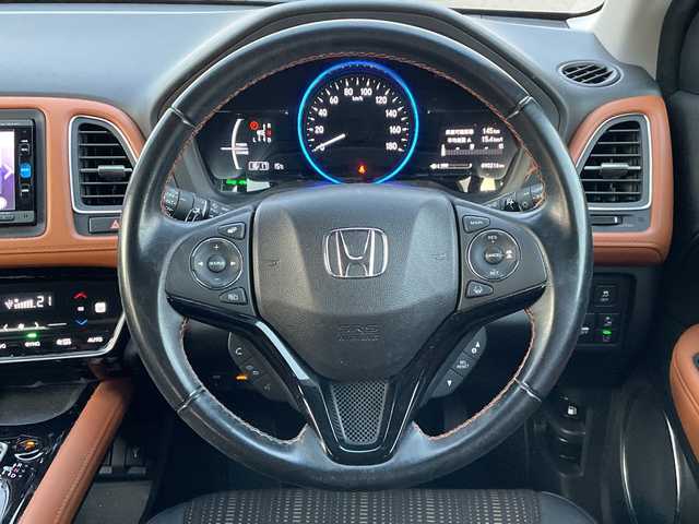 ホンダ ヴェゼル ハイブリッド Z ホンダセンシング 新潟県 2016(平28)年 9.1万km ルーセブラックM 4WD/純正SDナビ(VXM-164VFi)/CD/DVD/BT/フルセグテレビ/バックカメラ/ETC/衝突被害軽減ブレーキ/レーンキープアシスト/レーダークルーズコントロール/半革シート/シートヒーター/パドルシフト/ステアリングスイッチ/スマートキー/プッシュスタート/LEDヘッドライト/オートライト/フォグランプ/純正17インチアルミホイール