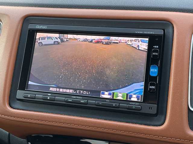 ホンダ ヴェゼル ハイブリッド Z ホンダセンシング 新潟県 2016(平28)年 9.1万km ルーセブラックM 4WD/純正SDナビ(VXM-164VFi)/CD/DVD/BT/フルセグテレビ/バックカメラ/ETC/衝突被害軽減ブレーキ/レーンキープアシスト/レーダークルーズコントロール/半革シート/シートヒーター/パドルシフト/ステアリングスイッチ/スマートキー/プッシュスタート/LEDヘッドライト/オートライト/フォグランプ/純正17インチアルミホイール