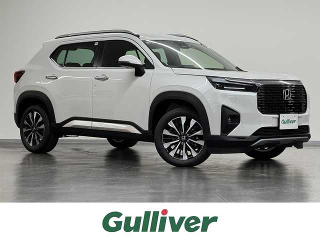 ホンダ ＷＲ－Ｖ Z+ 三重県 2024(令6)年 0.1万km未満 プラチナホワイトパール ガソリン/FF/CVT/登録済未使用車（登録時走行20km）　/純正9型ナビ LXM-242ZFNi/・（FM/AM/TV/CarPlay/AndroidAuto/Bluetooth/交通情報）　/バックカメラ　/Honda SENSING　/・CMBS　衝突軽減ブレーキ　/・ACC　アダプティブクルーズ　/・LKAS　車線維持支援システム　/・前後パーキングセンサーシステム　/・路外逸脱抑制機能　/・標識認識機能　/・オートハイビーム機能　/・先行車発進お知らせ機能　/装備/・ルーフレール　/・ハーフレザーシート　/・オートエアコン/・オートライト/・LED ヘッドライト＋フロントフォグライト/・パドルシフト　/・純正17inAW　/・保/取/ナビ取　/・スマートキーx2/DN登録時走行20km　
