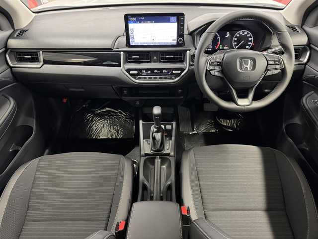 ホンダ ＷＲ－Ｖ Z+ 三重県 2024(令6)年 0.1万km未満 プラチナホワイトパール ガソリン/FF/CVT/登録済未使用車（登録時走行20km）　/純正9型ナビ LXM-242ZFNi/・（FM/AM/TV/CarPlay/AndroidAuto/Bluetooth/交通情報）　/バックカメラ　/Honda SENSING　/・CMBS　衝突軽減ブレーキ　/・ACC　アダプティブクルーズ　/・LKAS　車線維持支援システム　/・前後パーキングセンサーシステム　/・路外逸脱抑制機能　/・標識認識機能　/・オートハイビーム機能　/・先行車発進お知らせ機能　/装備/・ルーフレール　/・ハーフレザーシート　/・オートエアコン/・オートライト/・LED ヘッドライト＋フロントフォグライト/・パドルシフト　/・純正17inAW　/・保/取/ナビ取　/・スマートキーx2/DN登録時走行20km　