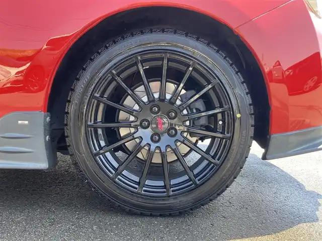 スバル ＢＲＺ プレミアムスポーツパッケージ 静岡県 2014(平26)年 6.8万km ライトニングレッド 社外メモリーナビ(AVIC-MRZ099W)/　AM　FM　CD　DVD　Bluetooth SD /フルセグTV/ETC/スマートキー×２/革巻きステアリング/シートヒーター/STi専用17インチアルミホイール/HIDオートヘッドライト/STiエアロ/６速MT/バックモニター/オレンジ＆ブラックレザーシート