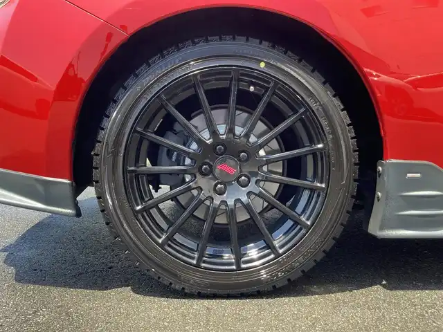 スバル ＢＲＺ プレミアムスポーツパッケージ 静岡県 2014(平26)年 6.8万km ライトニングレッド 社外メモリーナビ(AVIC-MRZ099W)/　AM　FM　CD　DVD　Bluetooth SD /フルセグTV/ETC/スマートキー×２/革巻きステアリング/シートヒーター/STi専用17インチアルミホイール/HIDオートヘッドライト/STiエアロ/６速MT/バックモニター/オレンジ＆ブラックレザーシート