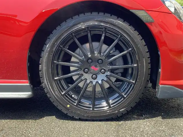 スバル ＢＲＺ プレミアムスポーツパッケージ 静岡県 2014(平26)年 6.8万km ライトニングレッド 社外メモリーナビ(AVIC-MRZ099W)/　AM　FM　CD　DVD　Bluetooth SD /フルセグTV/ETC/スマートキー×２/革巻きステアリング/シートヒーター/STi専用17インチアルミホイール/HIDオートヘッドライト/STiエアロ/６速MT/バックモニター/オレンジ＆ブラックレザーシート