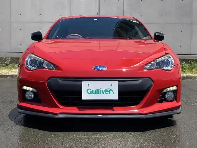 スバル ＢＲＺ プレミアムスポーツパッケージ 静岡県 2014(平26)年 6.8万km ライトニングレッド 社外メモリーナビ(AVIC-MRZ099W)/　AM　FM　CD　DVD　Bluetooth SD /フルセグTV/ETC/スマートキー×２/革巻きステアリング/シートヒーター/STi専用17インチアルミホイール/HIDオートヘッドライト/STiエアロ/６速MT/バックモニター/オレンジ＆ブラックレザーシート