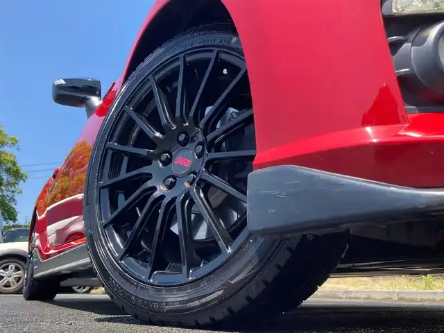 スバル ＢＲＺ プレミアムスポーツパッケージ 静岡県 2014(平26)年 6.8万km ライトニングレッド 社外メモリーナビ(AVIC-MRZ099W)/　AM　FM　CD　DVD　Bluetooth SD /フルセグTV/ETC/スマートキー×２/革巻きステアリング/シートヒーター/STi専用17インチアルミホイール/HIDオートヘッドライト/STiエアロ/６速MT/バックモニター/オレンジ＆ブラックレザーシート