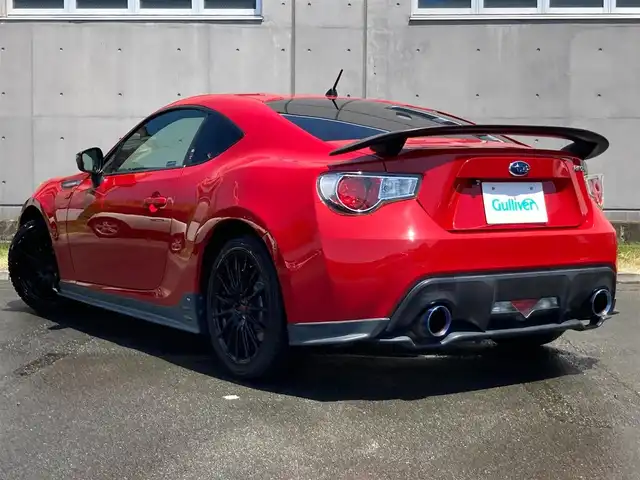 スバル ＢＲＺ プレミアムスポーツパッケージ 静岡県 2014(平26)年 6.8万km ライトニングレッド 社外メモリーナビ(AVIC-MRZ099W)/　AM　FM　CD　DVD　Bluetooth SD /フルセグTV/ETC/スマートキー×２/革巻きステアリング/シートヒーター/STi専用17インチアルミホイール/HIDオートヘッドライト/STiエアロ/６速MT/バックモニター/オレンジ＆ブラックレザーシート