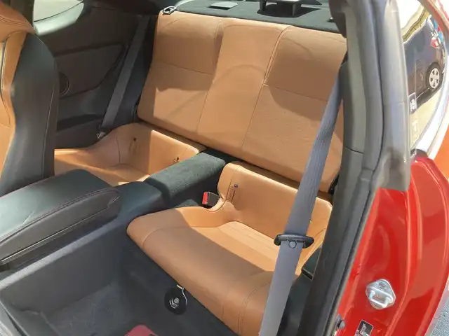 スバル ＢＲＺ プレミアムスポーツパッケージ 静岡県 2014(平26)年 6.8万km ライトニングレッド 社外メモリーナビ(AVIC-MRZ099W)/　AM　FM　CD　DVD　Bluetooth SD /フルセグTV/ETC/スマートキー×２/革巻きステアリング/シートヒーター/STi専用17インチアルミホイール/HIDオートヘッドライト/STiエアロ/６速MT/バックモニター/オレンジ＆ブラックレザーシート