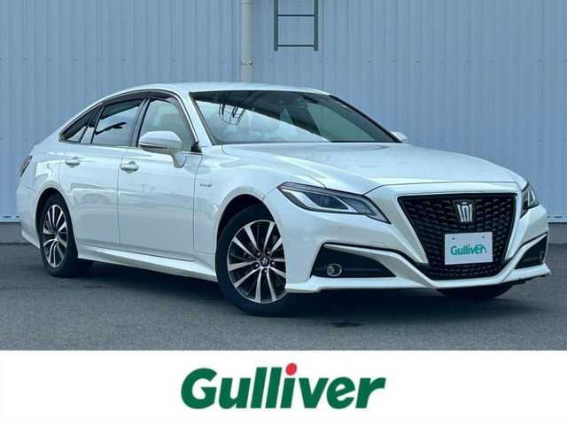 トヨタ クラウン ハイブリッド S Cパッケージ 愛媛県 2020(令2)年 2.3万km ホワイトパールクリスタルシャイン 純正17インチアルミホイール/ステアリングスイッチ/パドルシフト/純正ナビ/バックカメラ/トヨタセーフティ/追従クルコン/前席パワーシート/シートヒーター/ETC/ドラレコ/BSM/HUD/LED/オートライト/フォグランプ/革ステ/パワステ/パワーウィンドウ