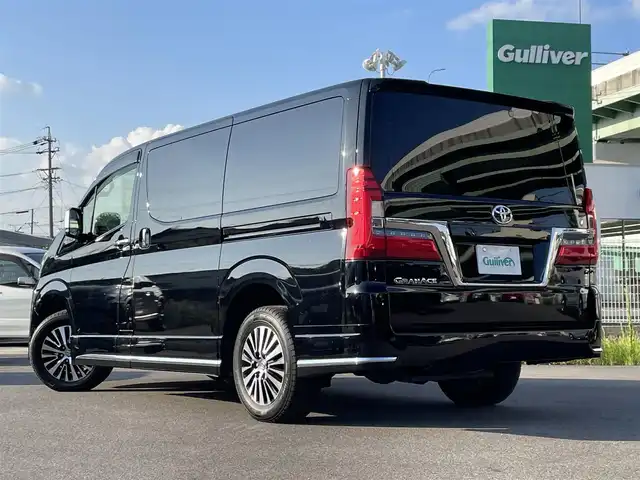 トヨタ グランエース G 愛知県 2020(令2)年 7.6万km ブラック 〇4列シート/〇純正8インチディスプレイオーディオ、ナビ/〇フルセグTV/〇Bluetooth/〇フリップダウンモニター/〇バックカメラ/〇パノラミックビューモニター/〇ビルトイン2.0ETC/〇ドライブレコーダー/〇両側パワースライドドア/〇トヨタセーフティセンス/・プリクラッシュセーフティ/・レーンディパーチャーアラート/・レーダークルーズコントロール/・オートマチックハイビーム/・ロードサインアシスト/〇先行車発進告知機能/〇ブラインドスポットモニター/〇リアクロストラフィックオートブレーキ/〇インテリジェントクリアランスソナー/〇LEDヘッドランプ/〇オートライト/〇LEDフロントフォグランプ/〇純正17インチAW/〇デジタルインナーミラー/〇木目調/革巻きコンビステアリングホイール/〇ステアリングスイッチ/〇前後左右独立オートエアコン/〇レザーシート/〇パワーシート/〇快適温熱シート/〇スマートエントリー