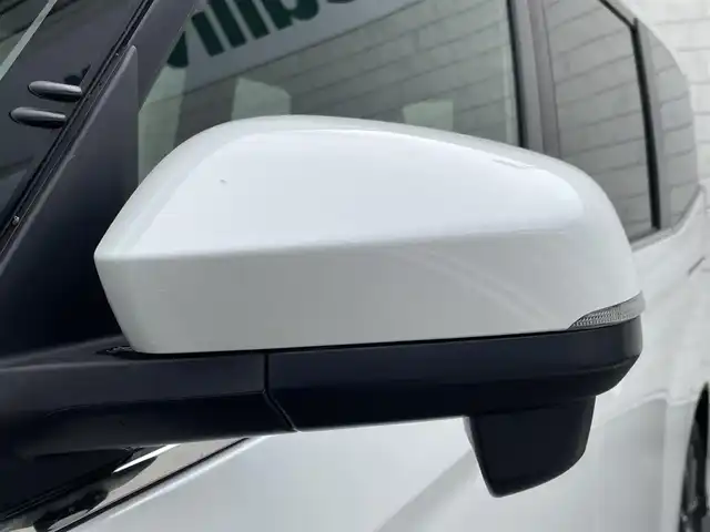 トヨタ ヴォクシー ハイブリッド S－Z 福岡県 2024(令6)年 1.8万km ホワイトパールクリスタルシャイン 純正10型メモリーナビ（フルセグTV/CD/DVD/BT/HDMI)バックカメラ衝突軽減ブレーキ14型有機LEDフリップダウンモニターコーナーセンサー両側パワスラレーダークルコン純正ドラレコビルトインETCシートヒーター純正フロアマット/LED/アルミホイールプッシュスタートスマートキー禁煙車