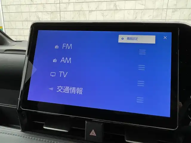 トヨタ ヴォクシー ハイブリッド S－Z 福岡県 2024(令6)年 1.8万km ホワイトパールクリスタルシャイン 純正10型メモリーナビ（フルセグTV/CD/DVD/BT/HDMI)バックカメラ衝突軽減ブレーキ14型有機LEDフリップダウンモニターコーナーセンサー両側パワスラレーダークルコン純正ドラレコビルトインETCシートヒーター純正フロアマット/LED/アルミホイールプッシュスタートスマートキー禁煙車