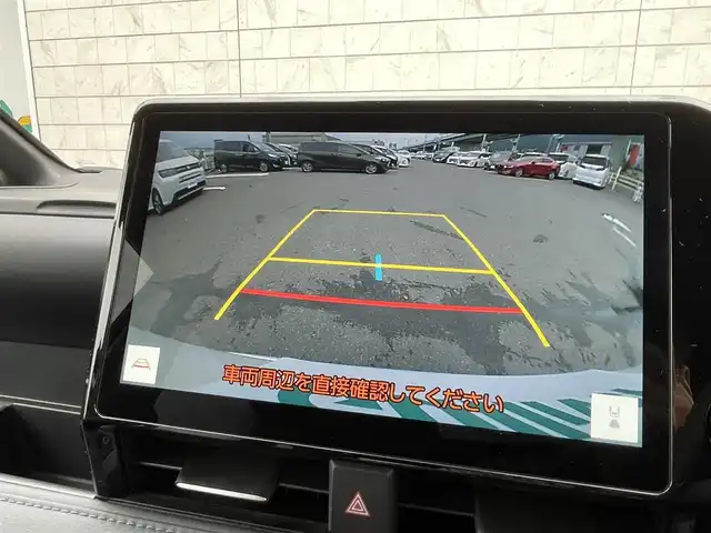 トヨタ ヴォクシー ハイブリッド S－Z 福岡県 2024(令6)年 1.8万km ホワイトパールクリスタルシャイン 純正10型メモリーナビ（フルセグTV/CD/DVD/BT/HDMI)バックカメラ衝突軽減ブレーキ14型有機LEDフリップダウンモニターコーナーセンサー両側パワスラレーダークルコン純正ドラレコビルトインETCシートヒーター純正フロアマット/LED/アルミホイールプッシュスタートスマートキー禁煙車