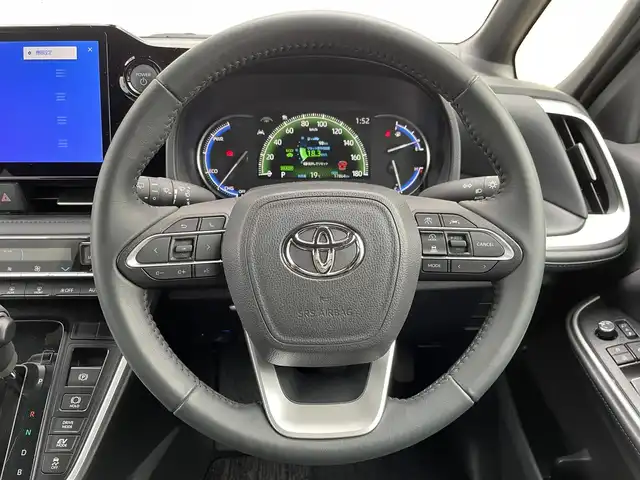 トヨタ ヴォクシー ハイブリッド S－Z 福岡県 2024(令6)年 1.8万km ホワイトパールクリスタルシャイン 純正10型メモリーナビ（フルセグTV/CD/DVD/BT/HDMI)バックカメラ衝突軽減ブレーキ14型有機LEDフリップダウンモニターコーナーセンサー両側パワスラレーダークルコン純正ドラレコビルトインETCシートヒーター純正フロアマット/LED/アルミホイールプッシュスタートスマートキー禁煙車