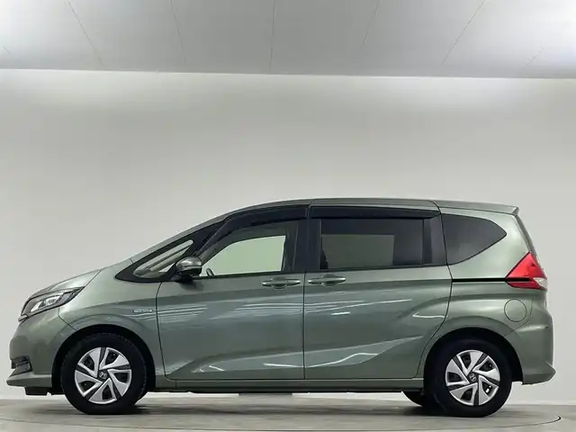 ホンダ フリード ハイブリット G ホンダセンシング 埼玉県 2020(令2)年 2.6万km シルバーミストグリーンM 純正ナビ 両側パワースライド　シートヒーター　バックカメラ　ＥＴＣ　ドライブレコーダー　フルセグＴＶ　スマートキー　Bluetooth　純正フロアマット　フルフラット　ウォークスルー　衝突軽減　