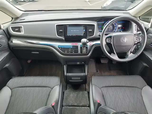 ホンダ オデッセイ ハイブリッド アブソルート ホンダセンシング 東京都 2016(平28)年 3.2万km ホワイトオーキッドパール Honda SENSING/・衝突軽減ブレーキ/・誤発進抑制機能/・歩行者事故低減ステアリング/・路外逸脱抑制機能/・アダプティブクルーズコントロール/・車線維持支援システム/・先行車発進お知らせ機能/・コーナーセンサー/プッシュスタート/純正ナビ/フルセグTV/バックカメラ/ETC/ドライブレコーダー/両側パワースライドドア/ハーフレザーシート/運転席パワーシート/オットマン/後席ロールサンシェード/LEDヘッドライト/ドアバイザー/17インチ純正アルミホイール/スマートキー