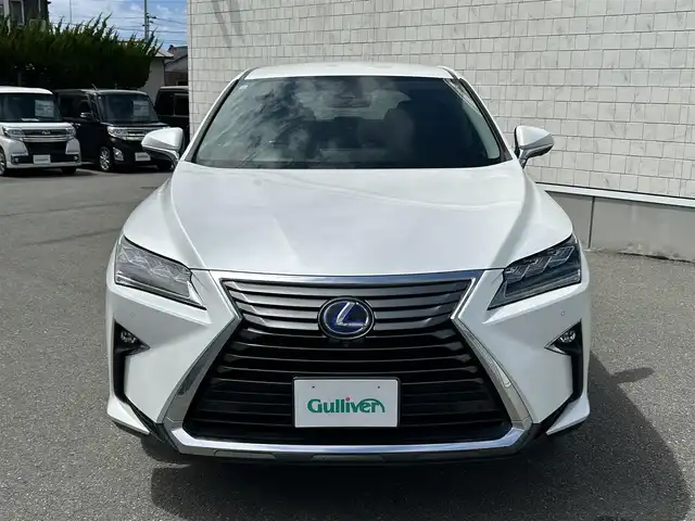 レクサス ＲＸ 450h バージョンL 山形県 2016(平28)年 6.8万km ソニッククォーツ ・4WD/・純正SDナビ/・CD/DVD/BD/SD/BT/フルセグ/・パノラミックビューモニター/・ビルトインETC2.0/・防眩インナーミラー/・レクサスセーフティシステム＋/・プリクラッシュセーフティ/・レーンキープアシスト/・アダプティブクルーズコントロール/・クリアランスソナー/・横滑り防止装置/・ブラインドスポットモニター/・ヘッドアップディスプレイ/・パワーバックドア/・100V電源/・オートマチックハイビーム/・LEDヘッドライト/・オートライト/・レザーシート/・全席シートヒーター/・D+N席シートエアコン/・全席パワーシート/・ステアリングヒーター/・純正20インチAW/・純正フロアマット/・プッシュスタート/・スマートキー/・保証書/・取扱説明