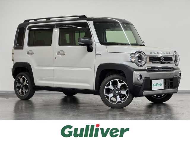 スズキ ハスラー Jスタイル ターボ 三重県 2021(令3)年 3.3万km ピュアホワイトパール/ガンメタリック2トーン フルタイム4WD/マイルドハイブリッド・ターボ/MTモード付インパネCVT/メーカーOP 純正9インチナビ/（CD/DVD/FM/AM/Bluetooth/USB/iPod/SmartDeviceLink/Apple CarPlay/AndroidAuto）/【OP】全方位モニター/ドライブレコーダー 前後/ビルトイン ETC/【OP】ルーフレール/スズキセーフティサポート/・デュアルカメラブレーキサポート/・車線逸脱警報機能／ふらつき警報機能／車線逸脱抑制機能/・アダプティブクルーズコントロール（全車速追従機能付）/・リヤパーキングセンサー/・標識認識機能（車両進入禁止、はみ出し通行禁止、最高速度、一時停止）/装備/【4WD車限定装備】/●スノーモードスイッチ/●グリップコントロール/●ヒルディセントコントロール/・シートヒーター（D/N）/・オートエアコン/・オートライト/・LED ヘッドランプ＋フロントフォグランプ/・ハイビームアシスト/・パドルシフト/・ステアリングスイッチ/・プッシュスタート/・電動格納ドアミラー（ウインカーランプ付）/・純正15inAW/・保/取/ナビ取