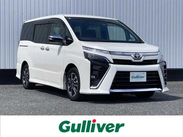 トヨタ ヴォクシー ZS 煌Ⅲ 千葉県 2021(令3)年 3万km ホワイトパールクリスタルシャイン ALPINE7インチナビ/(TV/SD/AM/FM/Bluetooth /Apple CarPlay /AndroidAuto)/フリップダウンモニター/バックカメラ/衝突被害軽減システム/車線逸脱警報/クルーズコントロール/ハーフレザーシート/両側パワースライドドア/横滑り防止装置/ETC/ドライブレコーダー/アイドリングストップ/LEDヘッドライト/フォグランプ/オートライト/ウィンカーミラー/電動格納ミラー/純正16インチAW/シートリフター/プッシュスタート/スマートキー/フロアマット/ドアバイザー
