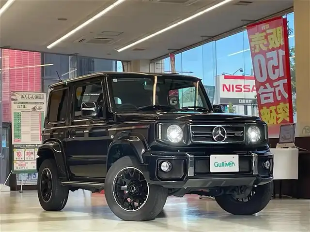 スズキ ジムニー シエラ JC 東京都 2021(令3)年 3万km ブルーイッシュブラックパール3 little G.STANDARD コンプリートキット/　フロントグリル/　フロントバンパー/　オーバーフェンダー＆アルミステップ/　サイドモール/　スペアタイヤカバー/　G15エンブレム/　little Gホイール/純正SDナビ/　フルセグTV　BT　DVD/CD/クルーズコントロール/シートカバー（黒）/革巻きステアリングホイール/LEDヘッドランプ/　オートライト/　ヘッドランプウォッシャー/電動格納ドアミラー/　ヒーター付き/プッシュスタート/保証書＆取扱説明書/エンブレムはベンツマークに架装されています。