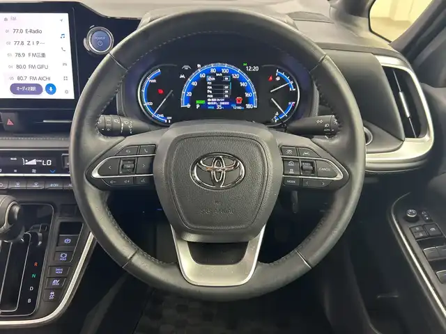 トヨタ ヴォクシー ハイブリッド S－Z 三重県 2023(令5)年 1.3万km アティチュードブラックマイカ 禁煙車/純正10.5型ディスプレイオーディオ/バックカメラ/プリクラッシュセーフティ/レーンディパーチャーアラート/クリアランスソナー/レーダークルーズコントロール/両側パワースライドドア/シートヒーター（D.N席）/純正フリップダウンモニター/100V淵源/ハーフレザーシート/ビルトインETC2.0/ドライブレコーダー（前後）/ステアリングスイッチ/オートハイビーム