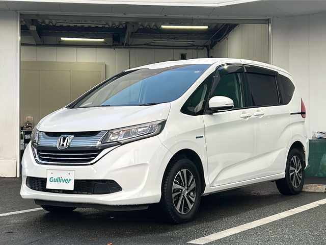 ホンダ フリード＋ ハイブリット G ホンダセンシング 京都府 2016(平28)年 5万km ホワイトオーキッドパール 純正ナビ〔VXM-175VFNi〕/　・フルセグＴＶ/　・CD/DVD再生/　・Bluetooth接続/　・SDミュージックサーバー/　・USB/　・AM/FMラジオ/バックカメラ/ETC/ドライブレコーダー/両側パワースライドドア/ハーフレザーシート/シートヒーター/純正15インチアルミ/LEDヘッドライト/プッシュスタート/スマートキー/保証書/整備記録簿/取扱説明書