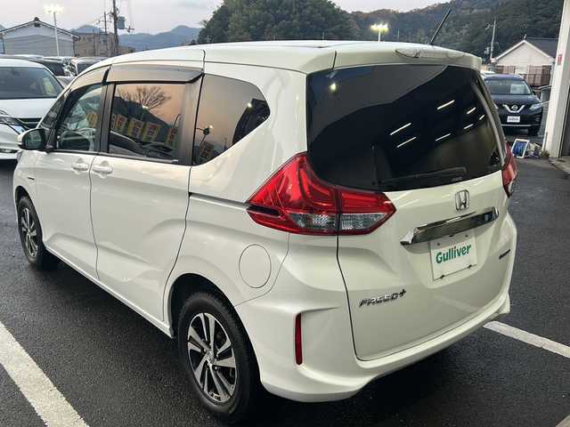 ホンダ フリード＋ ハイブリット G ホンダセンシング 京都府 2016(平28)年 5万km ホワイトオーキッドパール 純正ナビ〔VXM-175VFNi〕/　・フルセグＴＶ/　・CD/DVD再生/　・Bluetooth接続/　・SDミュージックサーバー/　・USB/　・AM/FMラジオ/バックカメラ/ETC/ドライブレコーダー/両側パワースライドドア/ハーフレザーシート/シートヒーター/純正15インチアルミ/LEDヘッドライト/プッシュスタート/スマートキー/保証書/整備記録簿/取扱説明書