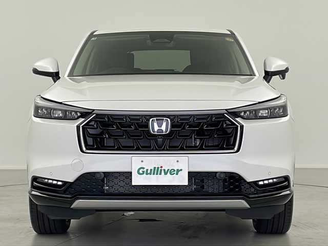 ホンダ ヴェゼル ハイブリッド e:HEV Z 岐阜県 2025(令7)年 0.1万km未満 プラチナホワイトパール Honda CONNECT 9インチディスプレーオーディオ/・ETC2.0車載器+ワイヤレス置くだけ充電器 (220000円)　/・Apple CarPlay/・Android Auto/・Bluetooth/・AM/FM/・USB/・車内WI-FI/フロントグリル　ベルリナブラック (41250円)/革巻きステアリング/・ハンドルヒーター/・ステアリングリモコン/・パドルシフト/スペアキー有/追従型クルーズコントロール/レーンキープアシスト/前後クリアランスソナー/電動パワーバックドア/ハーフレザーシート/・シートヒーター(D席/N席)/衝突軽減ブレーキ/・オートブレーキホールド/LEDヘッドライト/・オートライト/ダウンヒルアシストコントロール