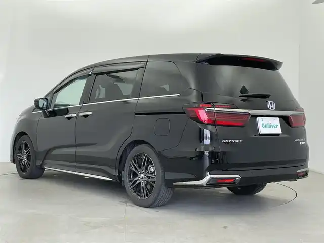 ホンダ オデッセイ ハイブリッド e:HEVアブソルート EX 富山県 2021(令3)年 2.9万km プレミアムスパークルブラックパール 純正11インチナビ/FM/AM/CD/DVD/BT/フルセグTV/後席モニター/全方位カメラ/ACC/パーキングアシスト/ビルトインETC2.0/前後ドライブレコーダー/パワーバックドア/両側パワースライドドア/ハーフレザーシート/パワーシート（D+N席）/シートヒーター（D+N席）/スマートキー/路外逸脱警報機能/衝突被害軽減システム/横滑り防止装置/BSM/コーナーセンサー/電動パーキング/オートブレーキホールド/純正フロアマット/純正18インチAW