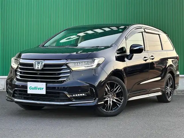 ホンダ オデッセイ ハイブリッド e:HEVアブソルート EX 宮城県 2021(令3)年 1.1万km プレミアムヴィーナスブラックP ホンダセンシング/・衝突軽減ブレーキ/・歩行者事故低減ステアリング/・アダプティブクルーズコントロール/・車線維持支援システム/・路外逸脱抑制機能/・誤発進抑制機能/・先行車発進お知らせ機能/・標識認識機能/・後方誤発進抑制機能/マルチビューカメラシステム/スマートパーキングアシストシステム/パーキングセンサー/ブラインドスポットインフォメーション/純正10インチナビ（VXU-217DYi）/・CD/DVD/・Bluetooth/・フルセグTV/ビルトインETC2.0/ドライブレコーダー/AC100V/1500Wコンセント/ハンズフリーパワーバックドア/両側パワースライドドア/ハーフレザーシート/シートヒーター/パワーシート/2列目プレミアムクレードルシート/電動パーキングブレーキ/ブレーキホールド/LEDヘッドランプ/フォグランプ/オートライト/スマートキー＆プッシュスタート/純正18インチAW/フロアマット/ドアバイザー/W/サイド/カーテンエアバッグ