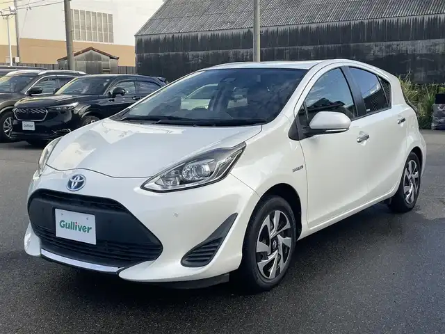 トヨタ アクア S スタイルブラック 山形県 2019(令1)年 7万km ホワイトパールクリスタルシャイン トヨタセーフティセンス/純正SDナビ/　　【CD BT ワンセグ AUX AM/FM】/バックカメラ/LEDオートライト/アイドリングストップ/コーナーセンサー/ステアリングスイッチ/電動格納ウィンカーミラー/フロアマット/スマートキー/ETC