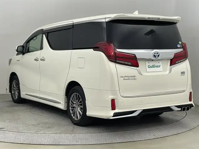 トヨタ アルファードハイブリット SR Cパッケージ 道央・札幌 2018(平30)年 6.3万km ラグジュアリーホワイトパールクリスタルシャインガラスフレーク ・４WD/・寒冷地仕様/・純正ナビ/　BT／CD／DVD／USB／SD／AUX／フルセグ/・全方位カメラ/・ビルトインETC2.0/・レーダークルーズコントロール/・前後コーナーセンサー/・レーンキープアシスト/・衝突軽減ブレーキ/・横滑り防止/・ブラインドスポットモニター/・デジタルインナーミラー/・両側パワースライドドア/・電動リアゲート/・前席シートヒーター/・運転席シートメモリー/・オットマン/・ステアリングヒーター/・JBLサウンド/・モデリスタエアロ/・LEDヘッドライト/・オートライト/・オートマチックハイビーム/・プッシュスタート/・スマートキー×2/・純正エンジンスターター/・純正フロアマット/・純正17インチAW