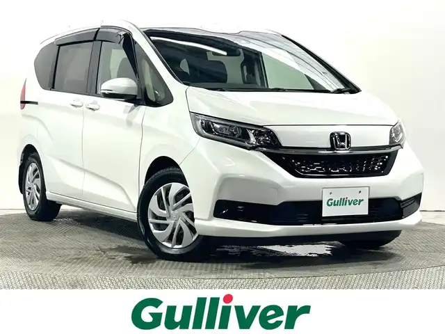 ホンダ フリード G 大阪府 2024(令6)年 0.7万km プラチナホワイトパール 純正9incナビ(フルセグ/DVD再生/Bluetooth) バックカメラ ETC 両側パワースライドドア 衝突軽減 レーダークルコン レーンアシスト シートヒーター 前後ドラレコ HDMI