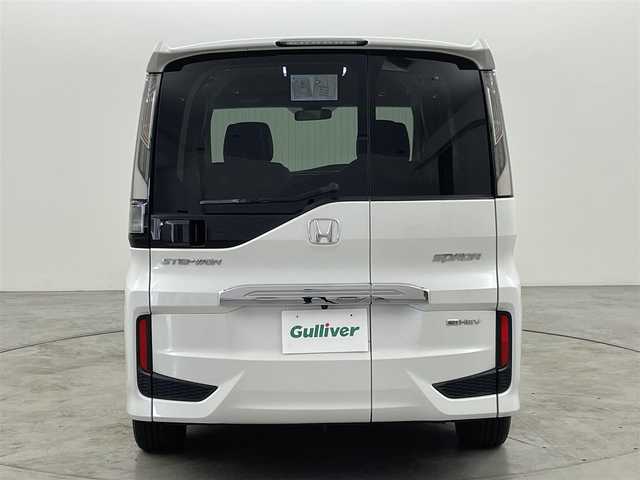 ホンダ ステップワゴン スパーダ eHEV G EXホンダS 福岡県 2021(令3)年 3.9万km プラチナホワイトパール 純正１１．６型後席モニター　/純正９型ナビ　/バックカメラ　/ビルトインＥＴＣ２．０　/アダプティブクルコン　/衝突軽減ブレーキ　/レーンキープ　/ハーフレザー　/シートヒーター　/両側電動スライドドア　/わくわくゲート