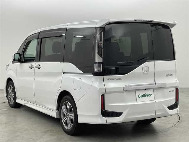 ホンダ ステップワゴン スパーダ eHEV G EXホンダS 福岡県 2021(令3)年 3.9万km プラチナホワイトパール 純正１１．６型後席モニター　/純正９型ナビ　/バックカメラ　/ビルトインＥＴＣ２．０　/アダプティブクルコン　/衝突軽減ブレーキ　/レーンキープ　/ハーフレザー　/シートヒーター　/両側電動スライドドア　/わくわくゲート