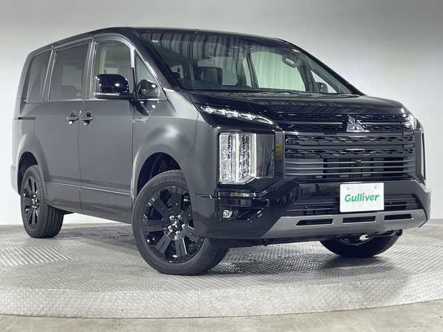 三菱 デリカＤ：５ シャモニー 神奈川県 2025(令7)年 0.1千km 黒Ⅱ 登録済未使用車/４WD/ディーゼルターボ/社外11型メモリーナビゲーション【EX11NX】/社外12.8型フリップダウンモニター/フルセグ　CD DVD　USB　HDMI　Bluetooth　SD　/マルチアラウンドビューモニター【自動防眩ミラー】/社外バックカメラ/両側電動スライドドア/パワーバックドア/e-アシスト/衝突被害軽減ブレーキアシスト/車線逸脱警報システム/レーダークルーズコントロール/オートマチックハイビーム/誤発進抑制機能/後側方車両検知警報システム/後退時車両検知警報所ステム/レーダークルーズコントロール/オートストップ＆ゴー/革巻きステアリング/パドルシフト/ステアリングヒーター/ブラックスエード/合皮コンビシート/運転席パワーシート/前席シートヒーター/アルミペダル/電動パーキングブレーキ/オートブレーキホールド/プッシュスタート/スマートキー/LEDヘッドライト/オートライト/LEDフロントフォグランプ/純正18インチアルミホイール/純正リアスポイラー