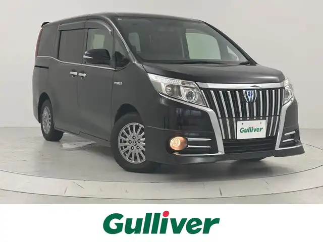 トヨタ エスクァイア ハイブリッド Gi 大阪府 2015(平27)年 5.8万km ブラック ブラックレザーシート/寒冷地仕様/両側パワースライドドア/純正メモリナビTV/バックカメラ/ETC/純正１５インチアルミ/クルーズコントロール/シートヒーター /ウッドコンビステアリング/ワンオーナー /スペアキー