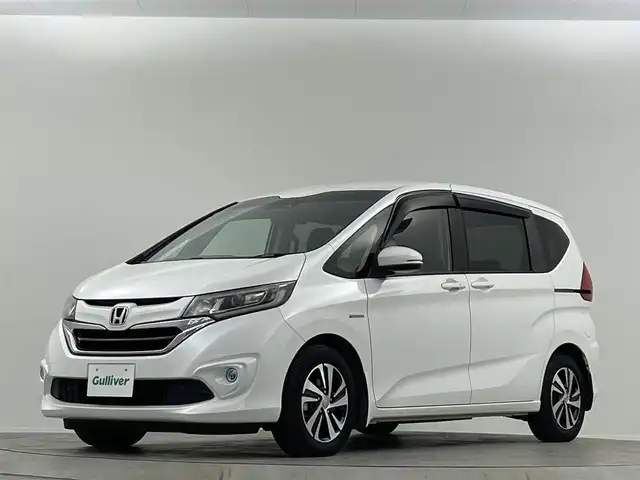 ホンダ フリード＋ ハイブリット EX 埼玉県 2016(平28)年 4.5万km ホワイトオーキッドパール 純正ナビ 両側電動スライドドア バックカメラ シートヒーター LEDヘッドライト　ETC 追従走行 ハーフレザー　フルセグTV　Bluetooth　CD/DVD　純正フロアマット　寒冷地仕様