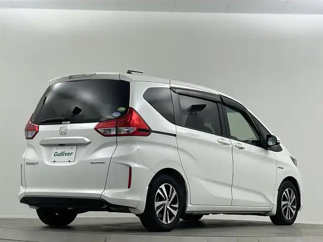 ホンダ フリード＋ ハイブリット EX 埼玉県 2016(平28)年 4.5万km ホワイトオーキッドパール 純正ナビ 両側電動スライドドア バックカメラ シートヒーター LEDヘッドライト　ETC 追従走行 ハーフレザー　フルセグTV　Bluetooth　CD/DVD　純正フロアマット　寒冷地仕様