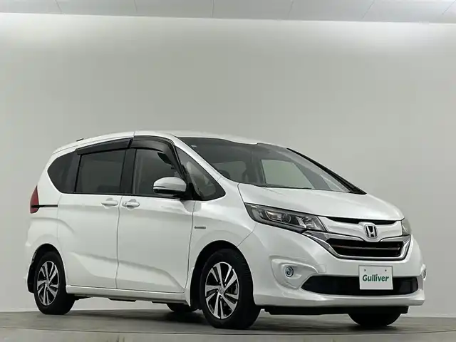 ホンダ フリード＋ ハイブリット EX 埼玉県 2016(平28)年 4.5万km ホワイトオーキッドパール 純正ナビ 両側電動スライドドア バックカメラ シートヒーター LEDヘッドライト　ETC 追従走行 ハーフレザー　フルセグTV　Bluetooth　CD/DVD　純正フロアマット　寒冷地仕様
