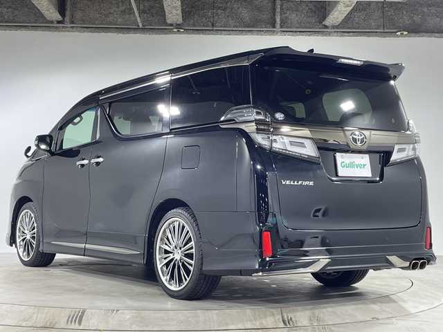 トヨタ ヴェルファイア ゴールデンアイズⅡ 福岡県 2021(令3)年 5.3万km ブラック ワンオーナー/純正ディスプレイオーディオ/フルセグテレビ/Bluetooth/CD/DVD/バックカメラ/フリップダウンモニター（12.1インチ純正）/クルーズコントロール/USB/ETC（ビルトイン）/オートマチックハイビーム/コーナーセンサー（前後）/パワーバックドア/フルエアロ（モデリスタ）/社外アルミ/ドアバイザー/LEDヘッドライト/両側パワースライドドア/ABS/横滑り防止装置/オートライト