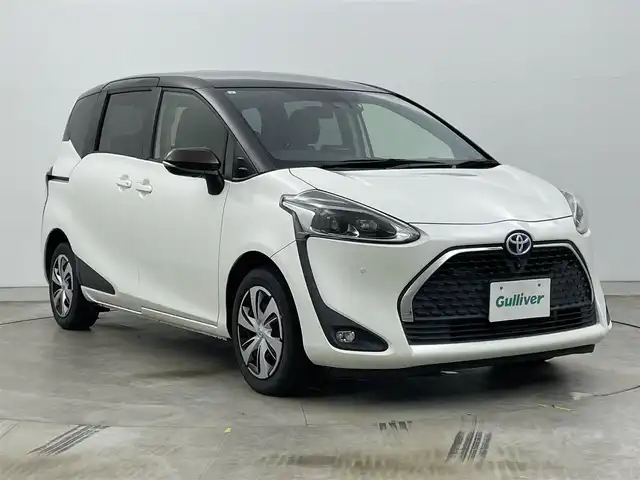 トヨタ シエンタ ハイブリッド G クエロ 岡山県 2021(令3)年 2.8万km ヴィンテージブラウンパールクリスタルシャイン/ホワイトパールクリスタルシャイン 社外9インチディスプレイオーディオ/Bluetooth/iPod/USB/パノラミックビューモニター/ステアリングヒーター/シートヒーター /ビルトインETC/前後ドライブレコーダー /LEDヘッドライト/両側パワースライドドア/セーフティセンス /オートハイビーム /前後ソナー/ヘッドレストモニター2列目左側 TVM-PW1000/オートライト / クルーズコントロール/プッシュスタート /スマートキー/新車保証書/取扱説明書/スペアキー×1