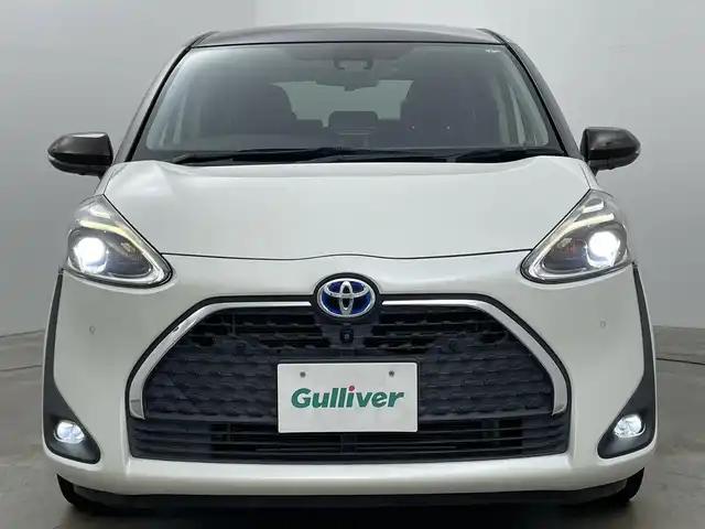 トヨタ シエンタ ハイブリッド G クエロ 岡山県 2021(令3)年 2.8万km ヴィンテージブラウンパールクリスタルシャイン/ホワイトパールクリスタルシャイン 社外9インチディスプレイオーディオ/Bluetooth/iPod/USB/パノラミックビューモニター/ステアリングヒーター/シートヒーター /ビルトインETC/前後ドライブレコーダー /LEDヘッドライト/両側パワースライドドア/セーフティセンス /オートハイビーム /前後ソナー/ヘッドレストモニター2列目左側 TVM-PW1000/オートライト / クルーズコントロール/プッシュスタート /スマートキー/新車保証書/取扱説明書/スペアキー×1