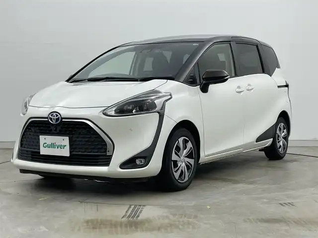 トヨタ シエンタ ハイブリッド G クエロ 岡山県 2021(令3)年 2.8万km ヴィンテージブラウンパールクリスタルシャイン/ホワイトパールクリスタルシャイン 社外9インチディスプレイオーディオ/Bluetooth/iPod/USB/パノラミックビューモニター/ステアリングヒーター/シートヒーター /ビルトインETC/前後ドライブレコーダー /LEDヘッドライト/両側パワースライドドア/セーフティセンス /オートハイビーム /前後ソナー/ヘッドレストモニター2列目左側 TVM-PW1000/オートライト / クルーズコントロール/プッシュスタート /スマートキー/新車保証書/取扱説明書/スペアキー×1