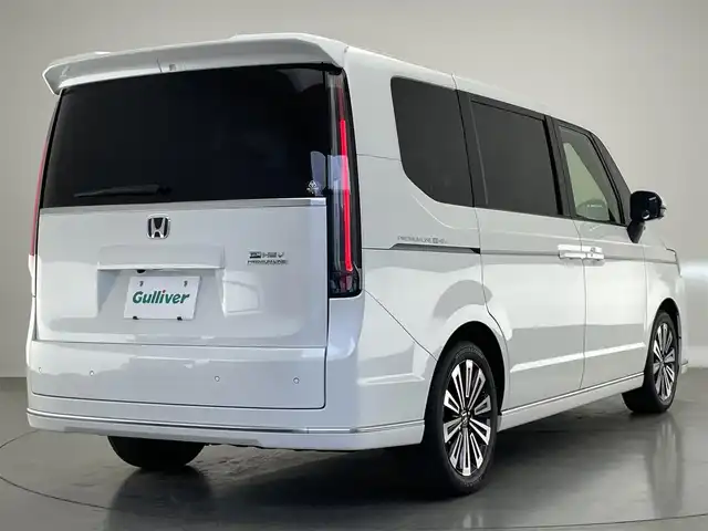 ホンダ ステップワゴン スパーダ eHEV プレミアムライン 愛知県 2023(令5)年 1.1万km プラチナホワイトパール 純正１１．４インチナビ/ホンダセンシング/ブラインドスポットモニター/パドルシフト/両側パワースライドドア/パワーバックドア/ミラー型ドラレコ/アラウンドビューモニター/レーダークルーズコントロール/フルセグTV/DVD/ハーフレザーシート/シートヒーター/LEDオートライト/フォグランプ/純正アルミホイール/ETC/コーナーセンサー/衝突被害軽減ブレーキ/禁煙車