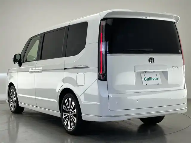 ホンダ ステップワゴン スパーダ eHEV プレミアムライン 愛知県 2023(令5)年 1.1万km プラチナホワイトパール 純正１１．４インチナビ/ホンダセンシング/ブラインドスポットモニター/パドルシフト/両側パワースライドドア/パワーバックドア/ミラー型ドラレコ/アラウンドビューモニター/レーダークルーズコントロール/フルセグTV/DVD/ハーフレザーシート/シートヒーター/LEDオートライト/フォグランプ/純正アルミホイール/ETC/コーナーセンサー/衝突被害軽減ブレーキ/禁煙車
