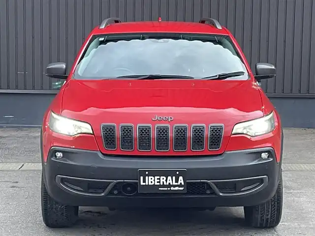 クライスラー・ジープ ジープ チェロキー トレイルホーク 青森県 2019(令1)年 4万km ファイアークラッカーレッド 純正ナビ/(フルセグTV/Bluetooth/AM/FM)/バックカメラ/前席パワーシート/前後ドライブレコーダー/電動リアゲート/ブラインドスポットモニター/パドルシフト/レーダークルーズコントロール/ETC/4WD/レーンキープアシスト/ルーフレール/前後コーナーセンサー/純正アルミホイール/純正フロアマット/オートライト/スマートキー/プッシュエンジンスタート