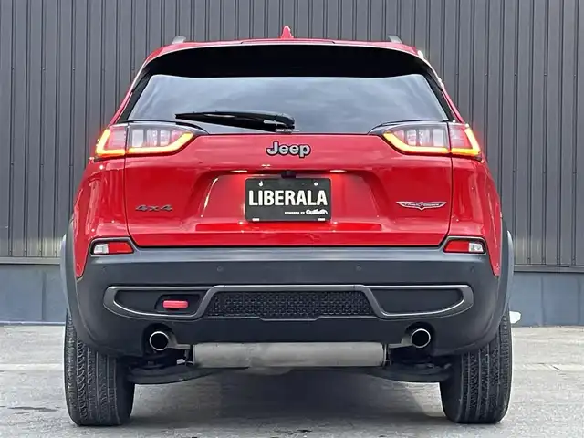 クライスラー・ジープ ジープ チェロキー トレイルホーク 青森県 2019(令1)年 4万km ファイアークラッカーレッド 純正ナビ/(フルセグTV/Bluetooth/AM/FM)/バックカメラ/前席パワーシート/前後ドライブレコーダー/電動リアゲート/ブラインドスポットモニター/パドルシフト/レーダークルーズコントロール/ETC/4WD/レーンキープアシスト/ルーフレール/前後コーナーセンサー/純正アルミホイール/純正フロアマット/オートライト/スマートキー/プッシュエンジンスタート