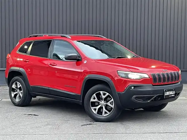 クライスラー・ジープ ジープ チェロキー トレイルホーク 青森県 2019(令1)年 4万km ファイアークラッカーレッド 純正ナビ/(フルセグTV/Bluetooth/AM/FM)/バックカメラ/前席パワーシート/前後ドライブレコーダー/電動リアゲート/ブラインドスポットモニター/パドルシフト/レーダークルーズコントロール/ETC/4WD/レーンキープアシスト/ルーフレール/前後コーナーセンサー/純正アルミホイール/純正フロアマット/オートライト/スマートキー/プッシュエンジンスタート